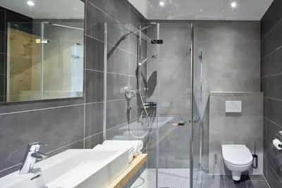 Ein Badezimmer in der Unterkunft Residenz Drachenstein Wildschönau