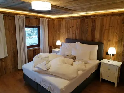 Ein Bett oder Betten in einem Zimmer der Unterkunft Oberholzer Landhaus & Appartement