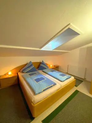 Ein Bett oder Betten in einem Zimmer der Unterkunft Ferienwohnung Tummener
