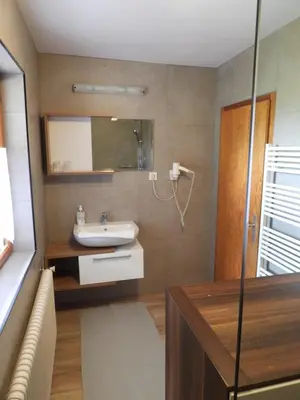 Ein Badezimmer in der Unterkunft Ferienhaus Oberlengau