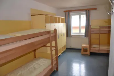 Ein Bett oder Betten in einem Zimmer der Unterkunft Jugendpension Müllauerhof