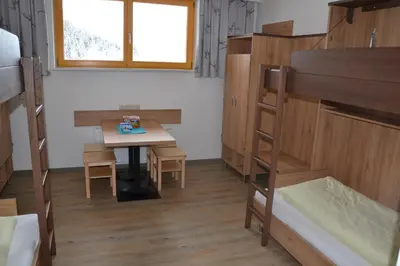 Ein Bett oder Betten in einem Zimmer der Unterkunft Jugendpension Müllauerhof