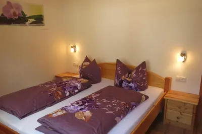 Ein Bett oder Betten in einem Zimmer der Unterkunft Ferienwohnung Kainer