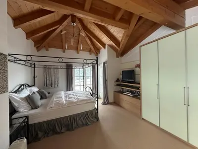 Ein Bett oder Betten in einem Zimmer der Unterkunft Villa Kitzbühel