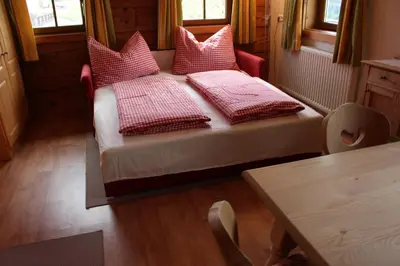 Ein Bett oder Betten in einem Zimmer der Unterkunft Bauernhof Mödling