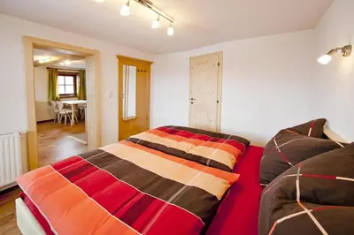 Ein Bett oder Betten in einem Zimmer der Unterkunft Bauernhof Mödling