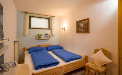 Ein Bett oder Betten in einem Zimmer der Unterkunft Haus Gabriele Appartement Frederic by NV-Appartements
