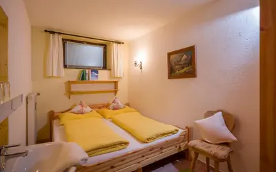 Ein Bett oder Betten in einem Zimmer der Unterkunft Haus Gabriele Appartement Frederic by NV-Appartements
