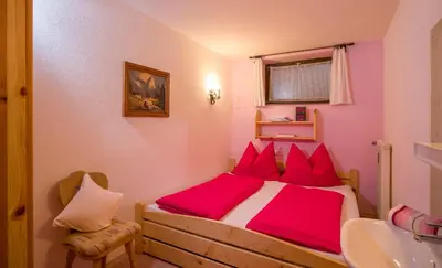 Ein Bett oder Betten in einem Zimmer der Unterkunft Haus Gabriele Appartement Frederic by NV-Appartements