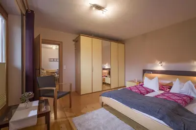 Ein Bett oder Betten in einem Zimmer der Unterkunft Ferienwohnung Hauser