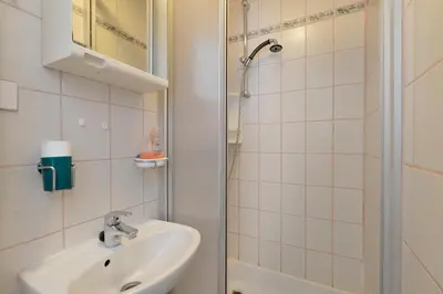 Ein Badezimmer in der Unterkunft Pension Feichter