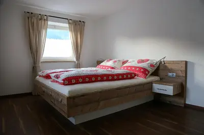 Ein Bett oder Betten in einem Zimmer der Unterkunft Ferienwohnung Köchl