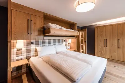 Ein Bett oder Betten in einem Zimmer der Unterkunft Alpbach Lodge Chalet Superior