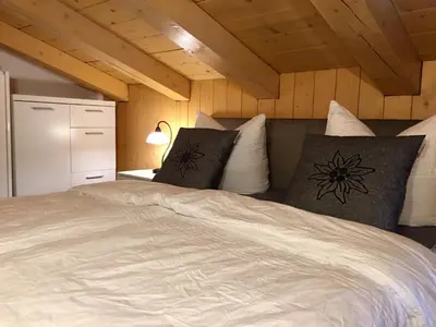 Ein Bett oder Betten in einem Zimmer der Unterkunft Alpensuite TOP 6 am Wilden Kaiser