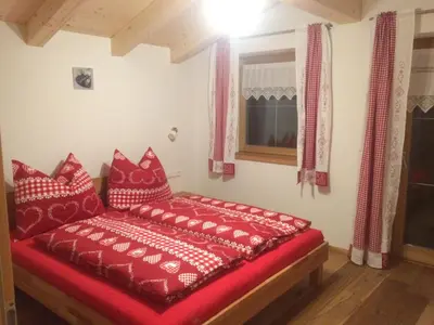Ein Bett oder Betten in einem Zimmer der Unterkunft Trixlhof