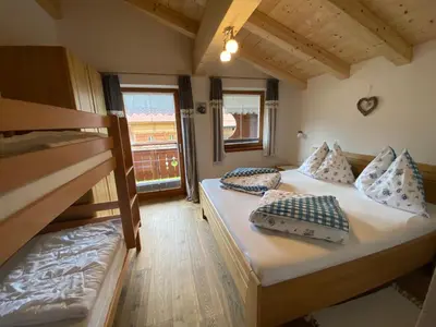 Ein Bett oder Betten in einem Zimmer der Unterkunft Trixlhof