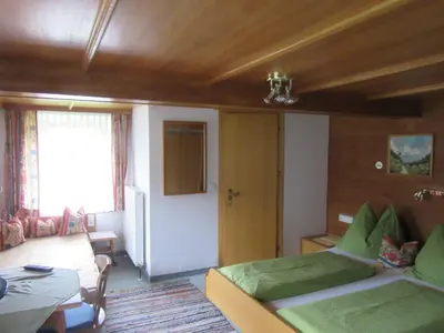Ein Bett oder Betten in einem Zimmer der Unterkunft Gasthof Waldrast