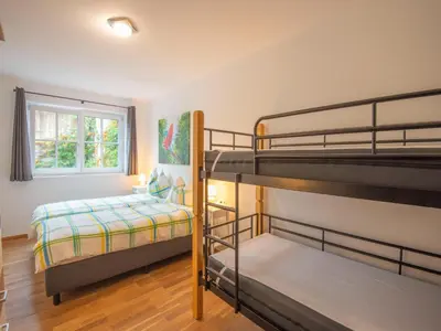 Ein Bett oder Betten in einem Zimmer der Unterkunft Modern Apartment in Brixen im Thale near Ski Area