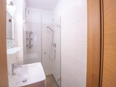 Ein Badezimmer in der Unterkunft Modern Apartment in Brixen im Thale near Ski Area