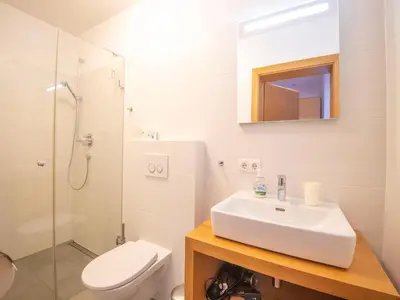 Ein Badezimmer in der Unterkunft Apartment near the ski slope in Brixen