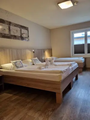 Ein Bett oder Betten in einem Zimmer der Unterkunft Cubo Sport & Art Hotel