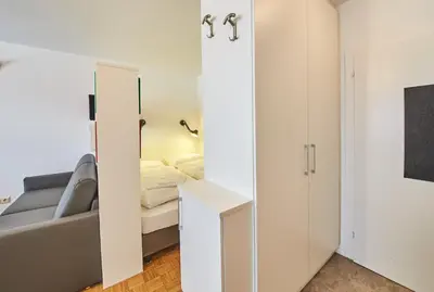 Ein Bett oder Betten in einem Zimmer der Unterkunft Appartement Relax & Sport
