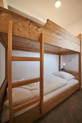 Ein Bett oder Betten in einem Zimmer der Unterkunft Appartement Relax & Sport