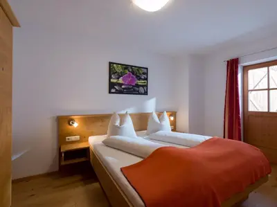 Ein Bett oder Betten in einem Zimmer der Unterkunft Franbichl