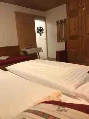 Ein Bett oder Betten in einem Zimmer der Unterkunft Das Enzian