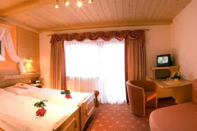 Ein Bett oder Betten in einem Zimmer der Unterkunft Pension Sunnberg