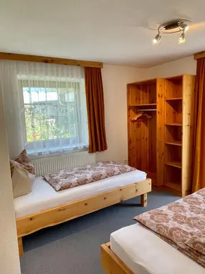 Ein Bett oder Betten in einem Zimmer der Unterkunft Ferienwohnung Rauch Mathilde