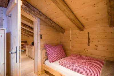 Ein Bett oder Betten in einem Zimmer der Unterkunft Chalet Ursteinhütte