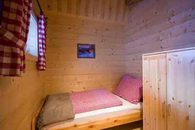 Ein Bett oder Betten in einem Zimmer der Unterkunft Chalet Ursteinhütte
