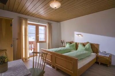 Ein Bett oder Betten in einem Zimmer der Unterkunft Pension Straifhof