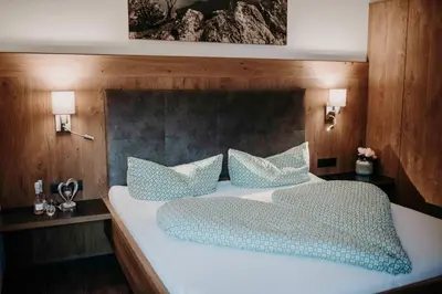 Ein Bett oder Betten in einem Zimmer der Unterkunft Green Apart