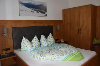 Ein Bett oder Betten in einem Zimmer der Unterkunft Green Apart