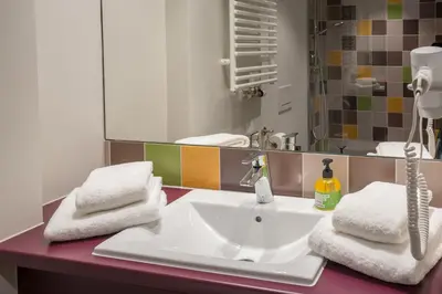 Ein Badezimmer in der Unterkunft Explorer Hotel Zillertal