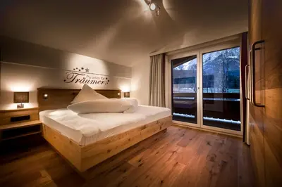 Ein Bett oder Betten in einem Zimmer der Unterkunft Appartements Die Rifflerin