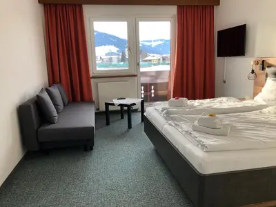 Ein Bett oder Betten in einem Zimmer der Unterkunft Sportpension Therese