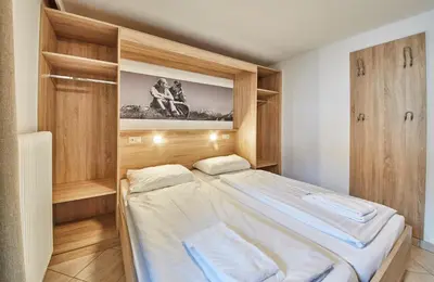 Ein Bett oder Betten in einem Zimmer der Unterkunft Ski & Bike Appartements Forsthaus