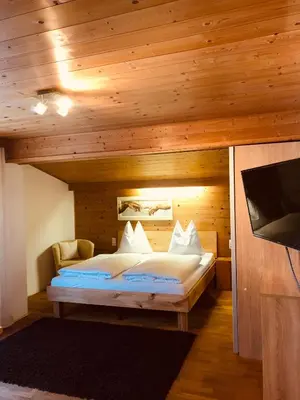 Ein Bett oder Betten in einem Zimmer der Unterkunft Haus Plangger