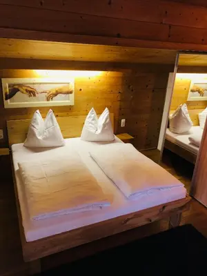 Ein Bett oder Betten in einem Zimmer der Unterkunft Haus Plangger