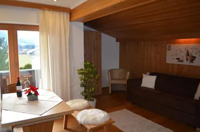 Ein Sitzbereich in der Unterkunft Haus Plangger