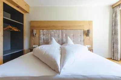 Ein Bett oder Betten in einem Zimmer der Unterkunft hin&weg das Aparthotel