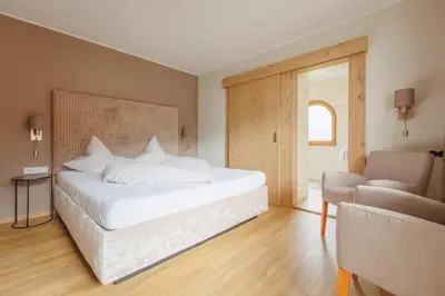 Ein Bett oder Betten in einem Zimmer der Unterkunft hin&weg das Aparthotel