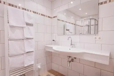 Ein Badezimmer in der Unterkunft hin&weg das Aparthotel