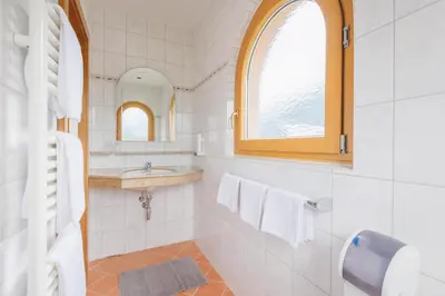 Ein Badezimmer in der Unterkunft hin&weg das Aparthotel