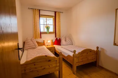 Ein Bett oder Betten in einem Zimmer der Unterkunft Apartment Bauernhof Thurnummerstall