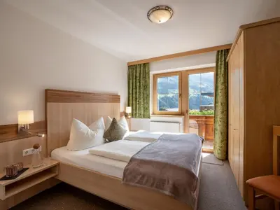 Ein Bett oder Betten in einem Zimmer der Unterkunft Apart Magdalena