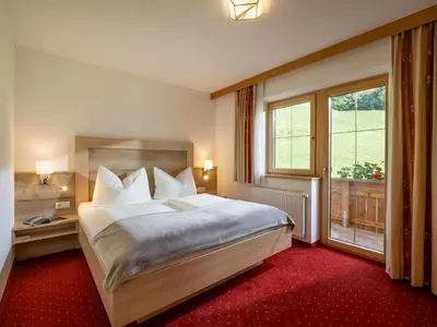 Ein Bett oder Betten in einem Zimmer der Unterkunft Apart Magdalena
